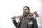 Hipster with beard and mustache hold axe