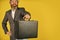 Hipster bearded face hold briefcase with bribe. Businessman run away business case. Happy smiling worker. Business man