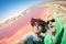 Hipster best friends at Walvis Bay pink salines in Namibia