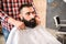 Hipster client visiting barber shop