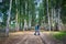 Hipster couple in the birch wood