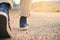 Hipster feet a man and jeans sneaker in nature