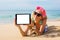 Hipster girl showing empty tablet on the beach, mockup for design.