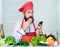 Hipster in hat and apron learning how cook online. Culinary education online. Elearning concept. Man chef searching