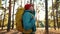 hipster hiker in the forest park. adventure a travel ecotourism concept. hiker tourist lifestyle with backpack. hipster