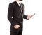 Hipster man in a classic suit isolated on a white background with a telephone in hand
