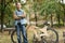 Hipster man with his cruiser wooden handmade bike