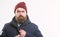 Hipster outfit. Man bearded hipster stand in warm black jacket parka isolated on white. Stylish and comfortable. Hipster