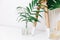Hipster Scandinavian style room interior. Nordic lamp with tropical leaves