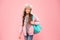 Hipster style. Modern backpack for daily life. Teen fashion. Schoolgirl street style clothes with cute bag. Travel and