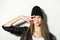 Hipster teenage girl with beanie hat posing