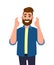 Hipster young man showing hopeful gesture sign with fingers crossed. Trendy bearded person making believe or wish symbol