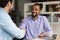 Hired African employee shake hand recruitment completing job interview