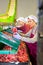 Hired farm worker checks and sorts peaches in warehouse