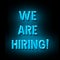We Are Hiring. Blue Neon sign isolated on a black background. Business. Design element.