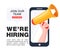 We are hiring concept. Recruitment agency. Smartphone screen with loudspeaker invites join our team word.