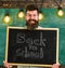 Hiring teachers concept. Man with beard and mustache on happy face welcomes colleagues, chalkboard on background