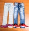 His and Hers Blue Jeans Laid with Shoes