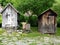 His and Hers Outhouses