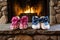 his and hers slippers side by side near a stone fireplace