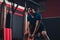 Hispanic athlete lifting kettlebell for training in gym