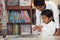 Hispanic Boys in Home-school Studying Rocks