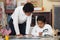 Hispanic Boys in Home-school Studying Rocks