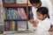 Hispanic Boys in Home-school Studying Rocks