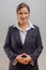 Hispanic or brazilian 40s businesswoman in business suit posing in studio