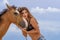 Hispanic Brunette Model And Horse On A Caribbean Beach