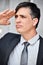 Hispanic Business Man Saluting Wearing Business Suit