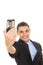 Hispanic businessman in suit taking a selfie