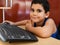 Hispanic child working with a computer