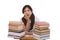 Hispanic college student woman with stack of books