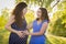 Hispanic Daughter Feels Baby Kick in Pregnant Motherâ€™s Tummy