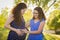 Hispanic Daughter Feels Baby Kick in Pregnant Motherâ€™s Tummy