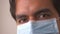 Hispanic doctor in surgical mask