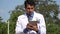 Hispanic doctor using tablet