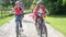 Hispanic Family On Cycle Ride In Countryside