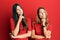 Hispanic family of mother and daughter wearing casual clothes over red background with hand on chin thinking about question,