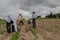 hispanic farmers manual amaranthus planting in a Mexico's farming field