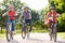 Hispanic Father And Children On Cycle Ride