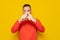 Hispanic man with beard over yellow background expression of rejection crossing his fingers making a rejection sign, he
