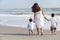 Hispanic Mother & Two Boy Children Family on Beach