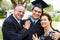 Hispanic Student And Parents Celebrate Graduation