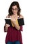 Hispanic teenage girl with glasses reading a book - On a white background