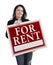 Hispanic Woman Holding For Rent Sign On White