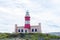 Historic Agulhas lighthouse at the most southern tip of Africa