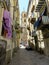 A historic alley in the city center of Palermo, Italy