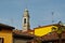 Historic bell tower of church in Italian village